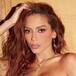 Anitta sube la temperatura con un beso apasionado en la ducha con estrella de rock