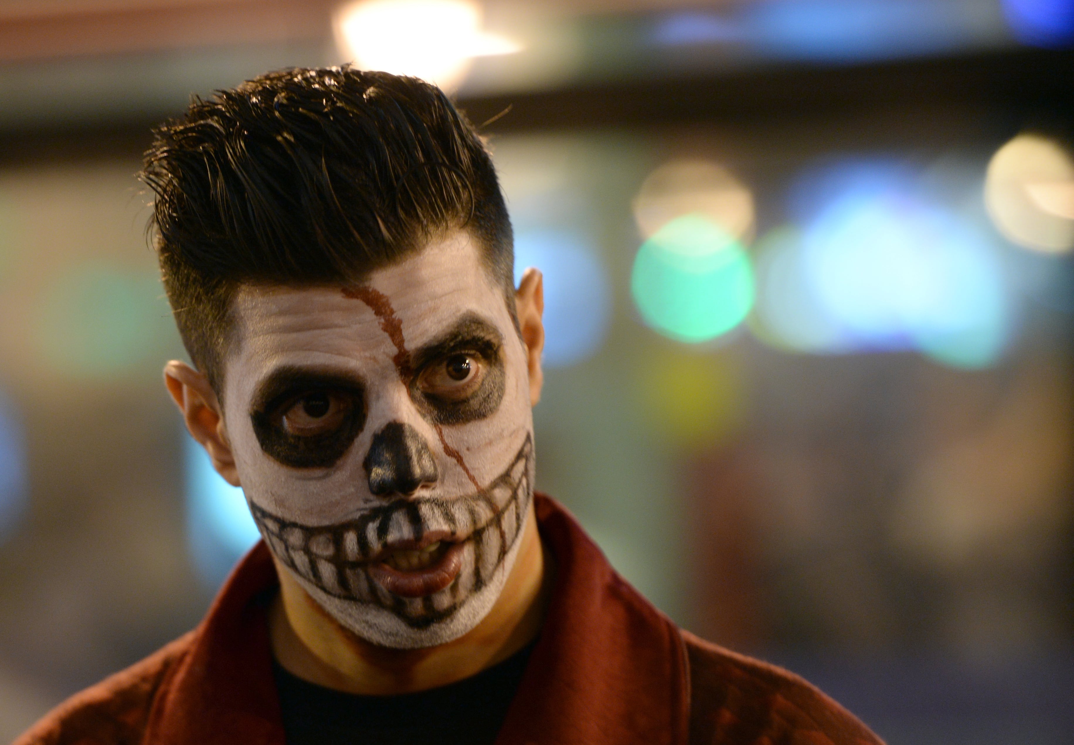 MADRID, SPAIN - OCTOBER 31:  A man dressed in Halloween costumes takes part in a Halloween parade in Madrid, Spain on October 31, 2014. (Photo by Evrim Aydin/Anadolu Agency/Getty Images)