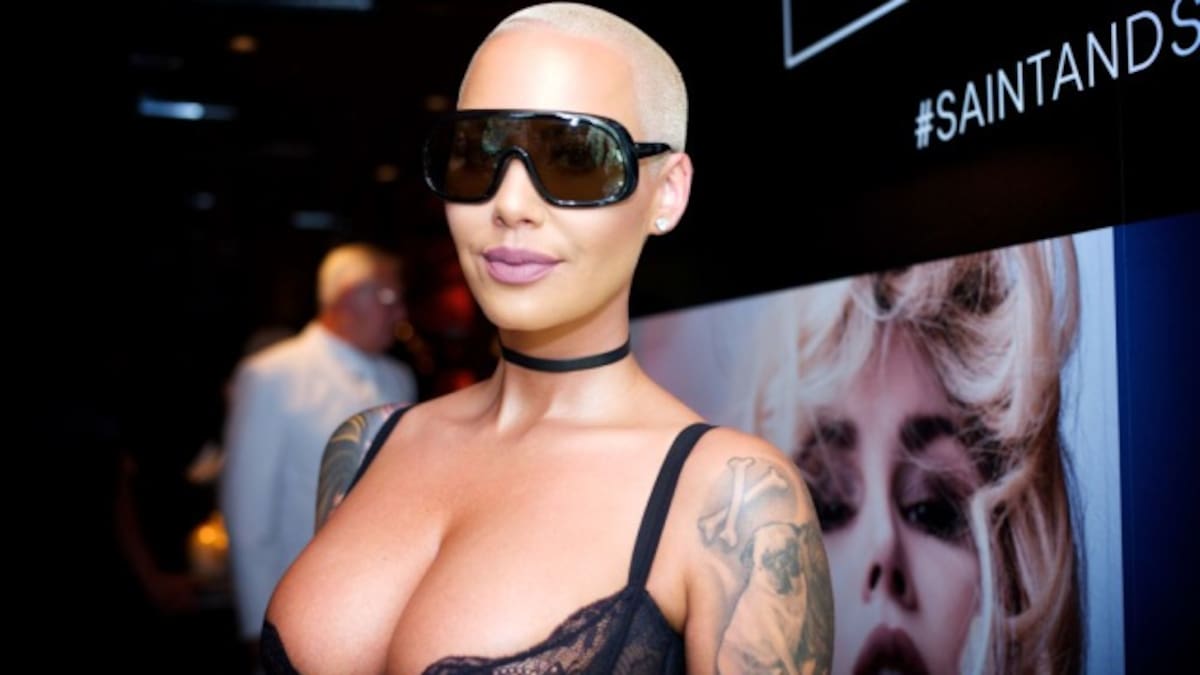 Amber Rose se tatúa a Slash donde antes tenía la cara de su ex Wiz Khalifa