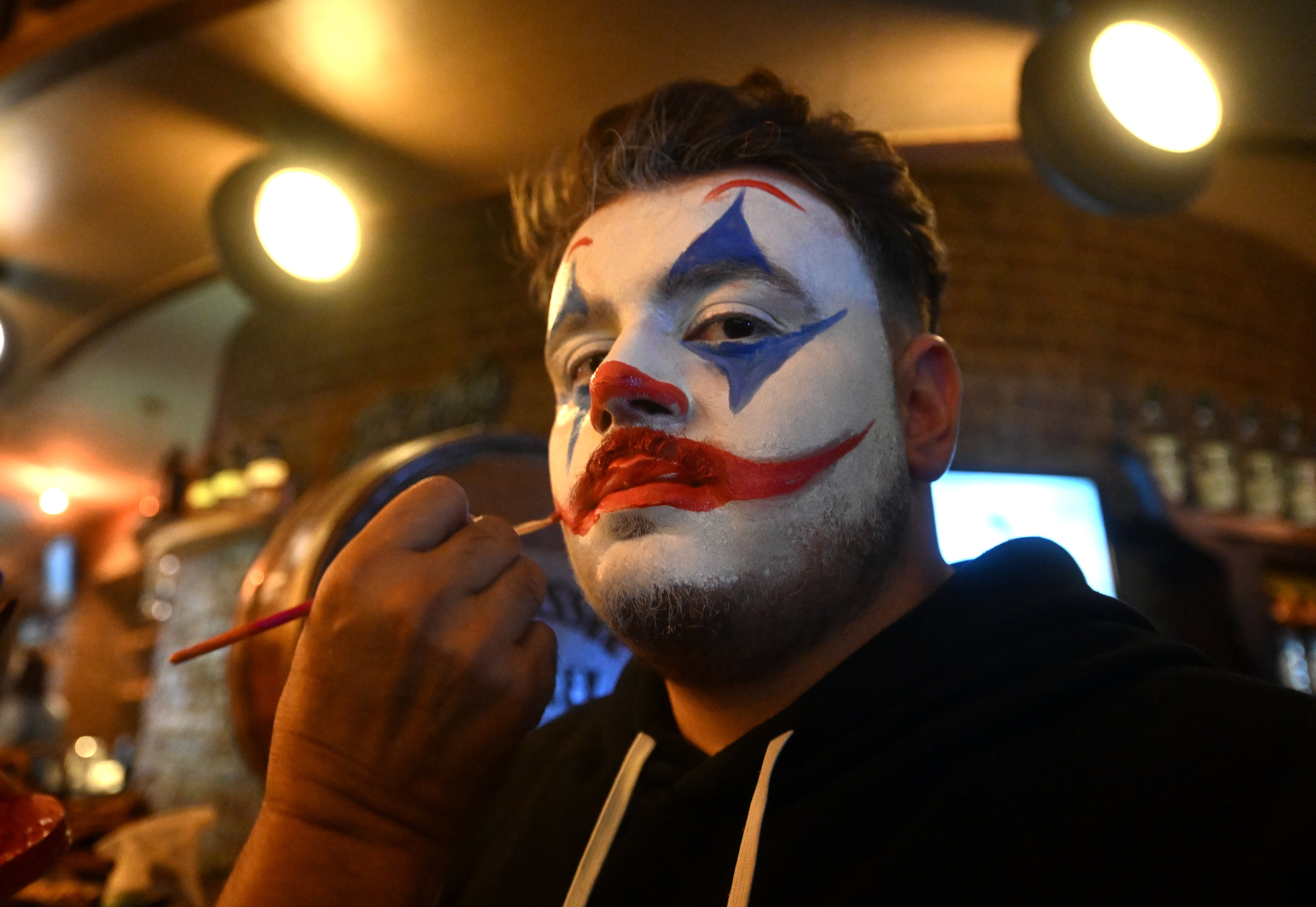 ANKARA, TURKIYE - OCTOBER 29: A man with halloween style make-up takes part in an event held with the theme "Halloween" in Ankara, Turkiye on October 29, 2023. (Photo by Evrim Aydin/Anadolu via Getty Images)
